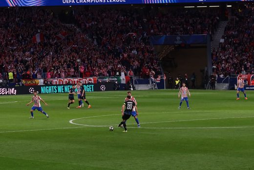 The Atlético end in full voice behind the Champions League boards