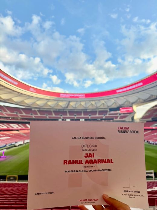 Jai Agarwal's LaLiga Business School diploma, Master in Global Sports Marketing, held up at the ceremony